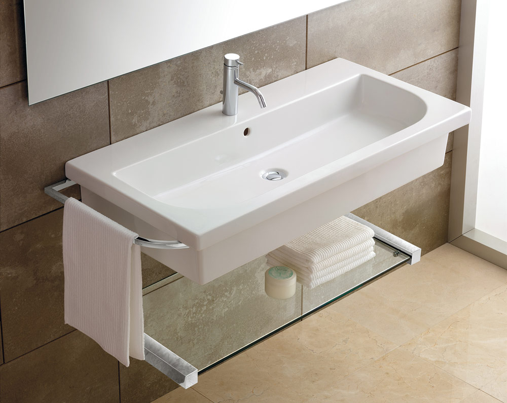 Wall mounted bathroom sink with chrome tap