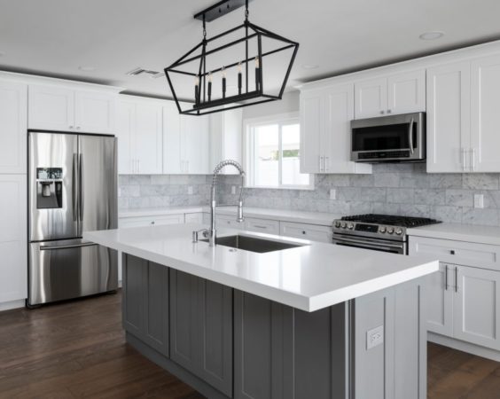 Color photo of a beautiful modern kitchen.